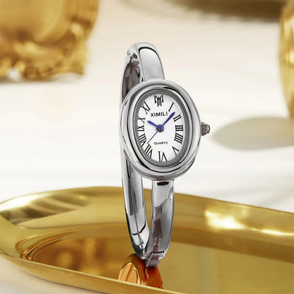 RELOJ PLATEADO OVALADO 🕑