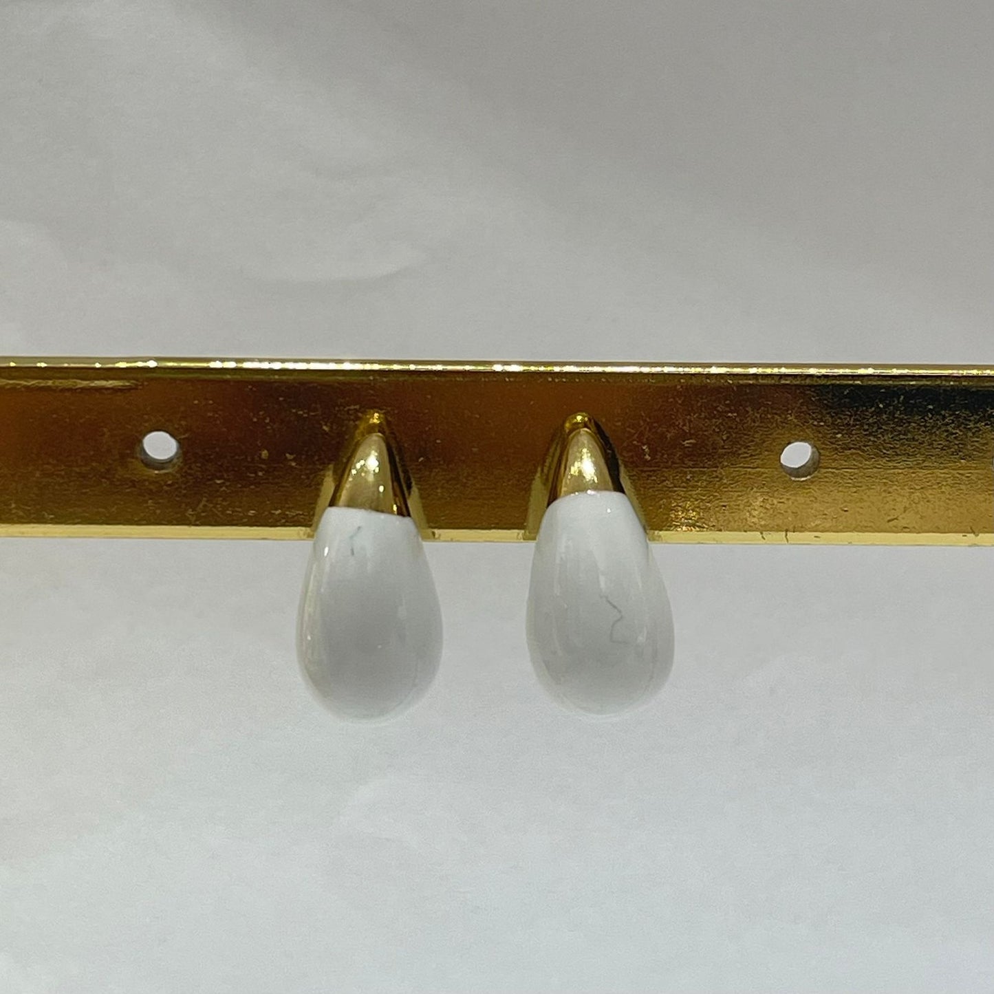 ARETES DE MARMOL