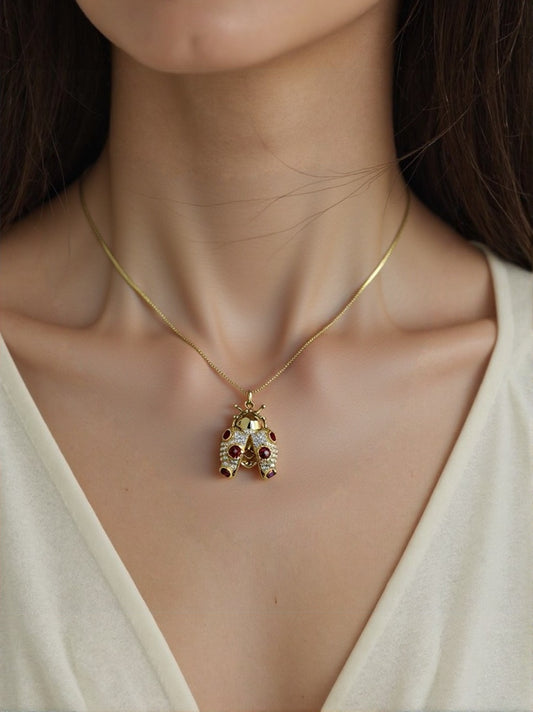 COLLAR MARIQUITA CON PIEDRAS MARRON 🐞